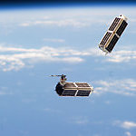 ISS038-E-044916 (11 Feb. 2014) --- A set of NanoRacks CubeSats is photographed by an Expedition 38 crew member after the deployment by the Small Satellite Orbital Deployer (SSOD). The CubeSats program contains a variety of experiments such as Earth observations and advanced electronics testing.