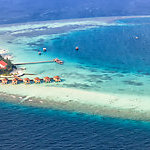 Aerial view of the Maayafushi Resort island, in Maldives.