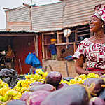 African woman selling vegetables on the market in Bamako, Mali.