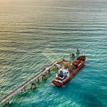 Aerial view of a chemical tanker waiting for loading.