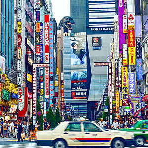 Colourful signs adorn buildings in the Shinjuku area of Tokyo, Japan.
